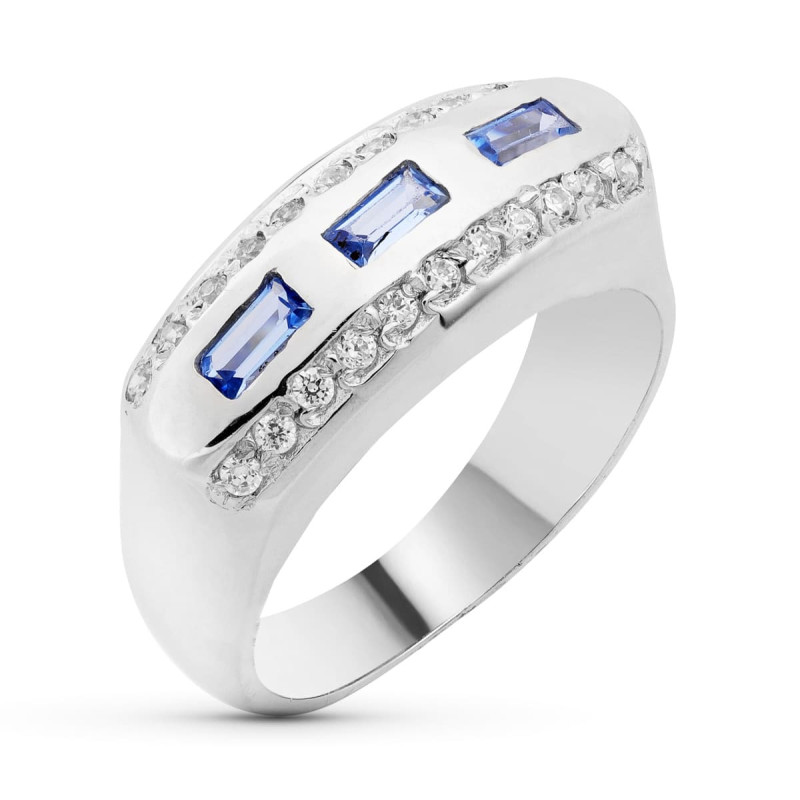 18K SORTIJA ORO BLANCO CON CIRCONITA AZULES BAGUETTE Y BLANCAS. ANCHO: 8 MM