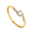 18K SOLITARIO ORO AMARILLO 4 GARRAS CON CIRCONITA CUERPO CRUZADO CON CIRCONITAS. MEDIDA CIRCONITA: 4 MM