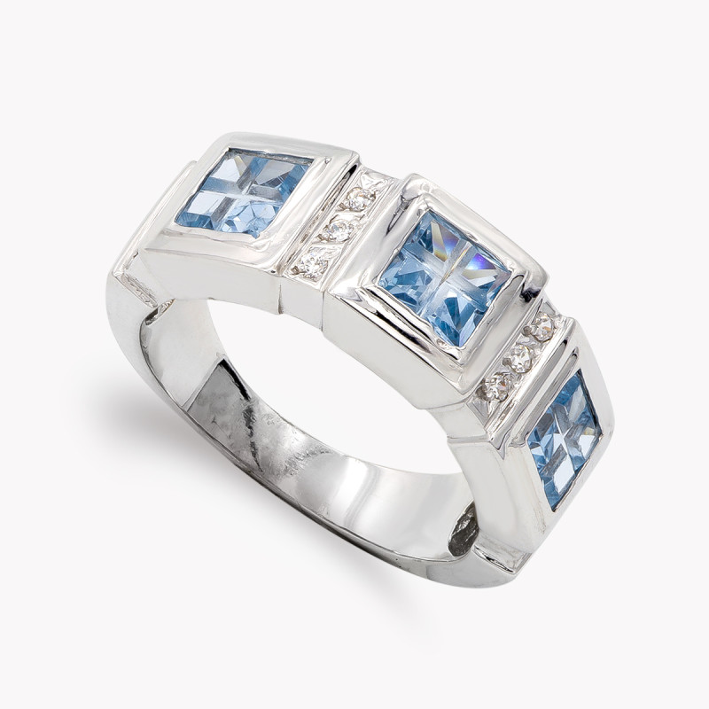 18K SORTIJA ORO BLANCO CON CIRCONITA  AGUAMARINA Y BLANCA. ANCHO: 8 MM