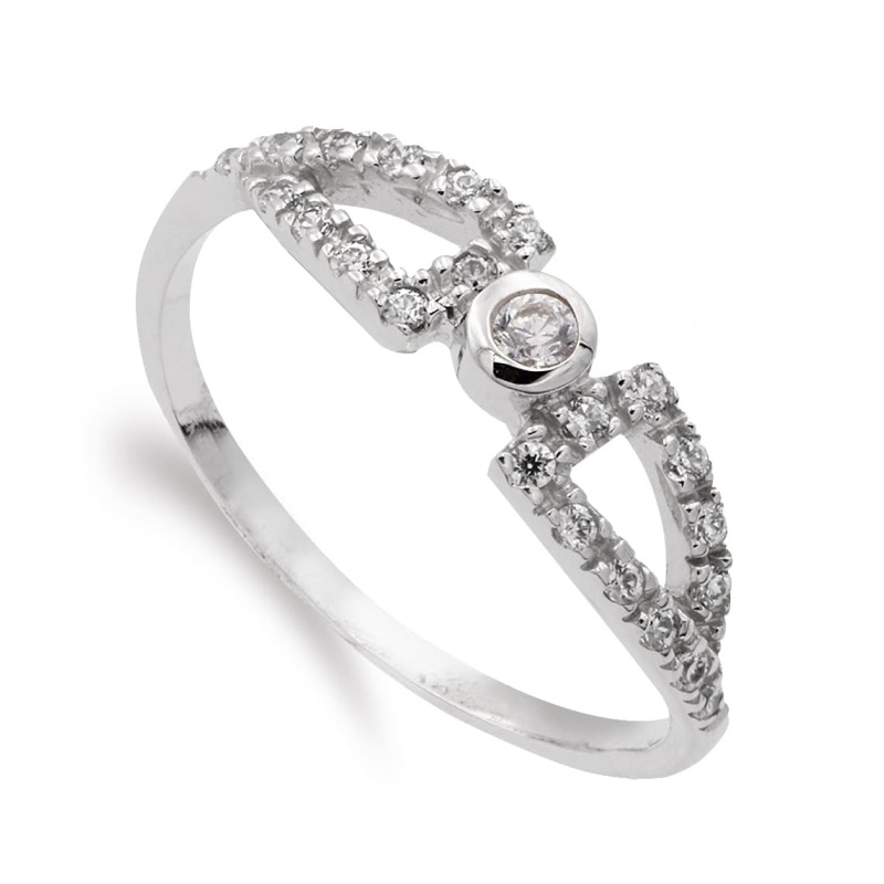 18K SORTIJA ORO BLANCO CON CIRCONITA CENTRAL. ANCHO: 5 MM