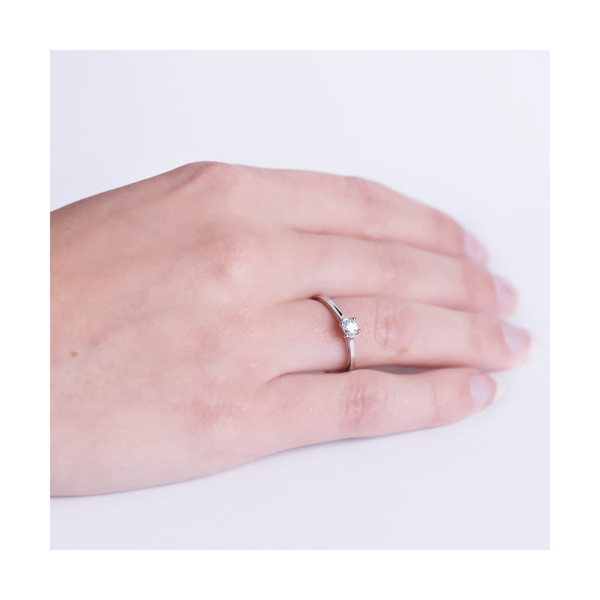 18K SOLITARIO DIAMANTE NATURAL TALLA BRILLANTE  0,150 QTS. SI-H