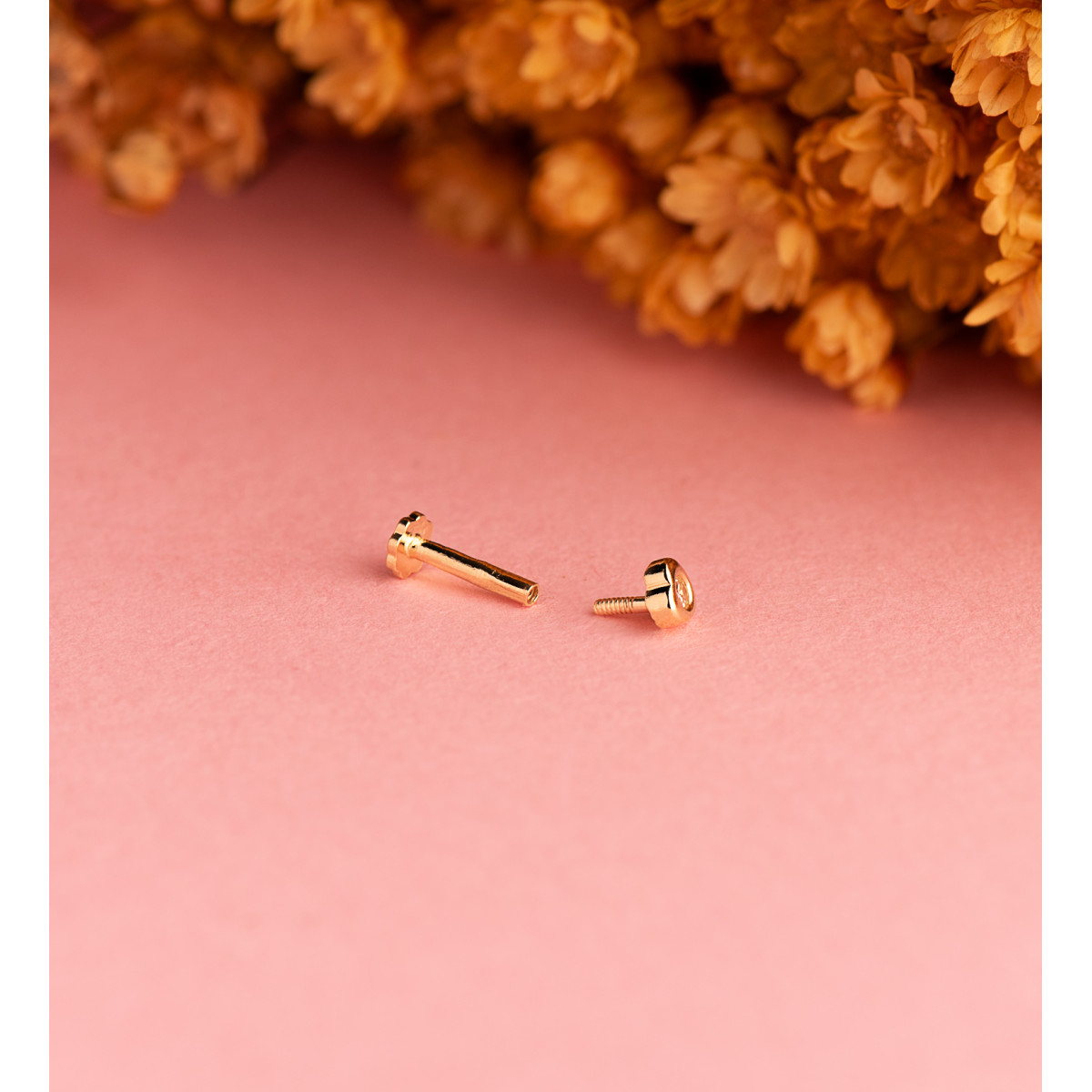 18K PIERCING DE OREJA ORO AMARILLO CORAZON 3X3 MM CON CIRCONITA. GRUESO BARRA 1.20 MM. CIERRE TUERCA