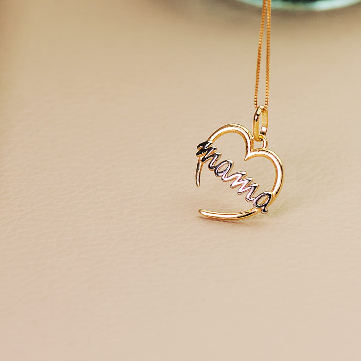 18K COLGANTE ORO BICOLOR CORAZON CON MAMA DE ORO BALNCO. 15X14 MM