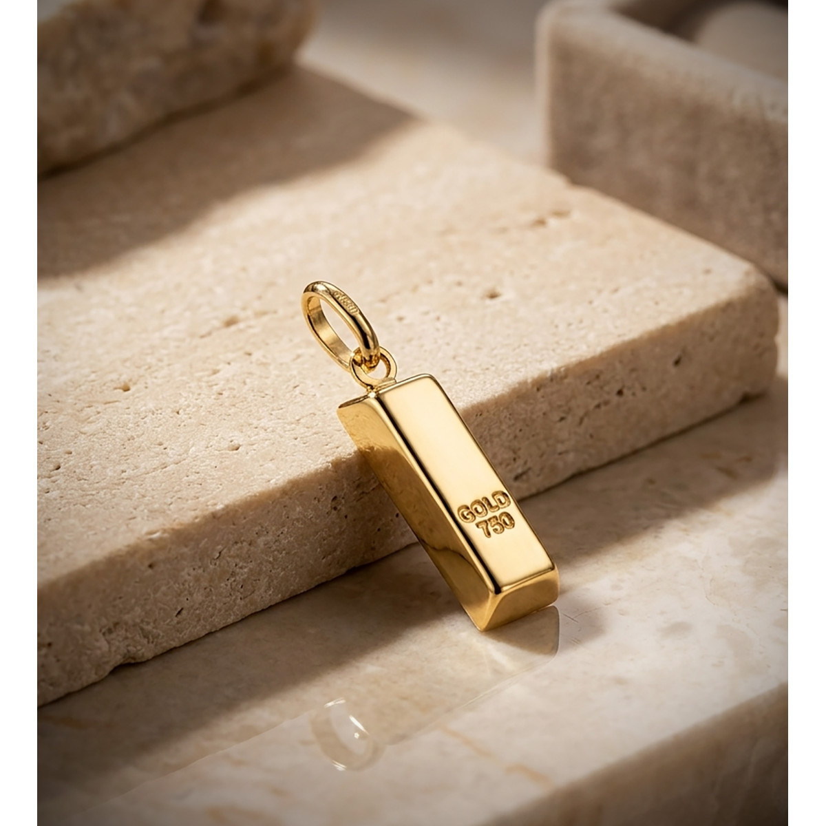 18K COLGANTE AMULETO ORO AMARILLO LINGOTE HUECO EN BRILLO. MEDIDA: 16 X 6 MM