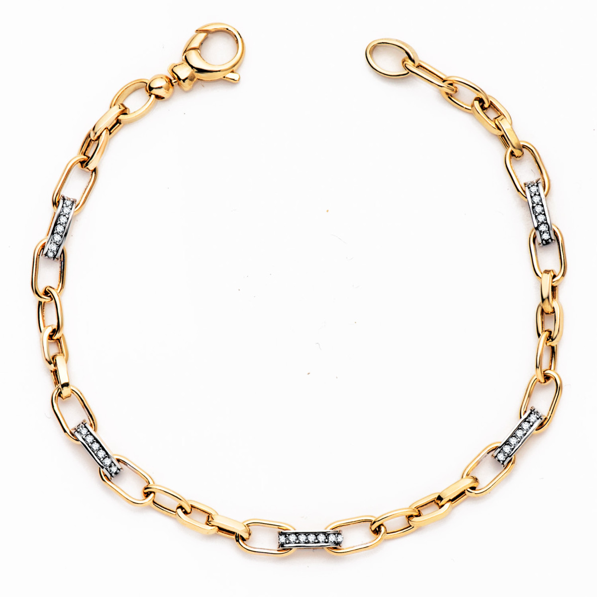 18K PULSERA ORO BICOLOR ESLABONES HUECOS Y CIRCONITA ANCHO: 4 MM. LARGO: 19CM