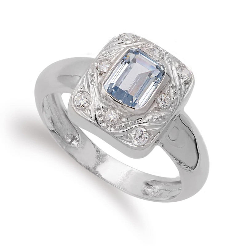 18K SORTIJA ORO BLANCO MOTIVO RECTANGULAR CON AGUAMARINA Y CIRCONITAS. ANCHO: 12 MM