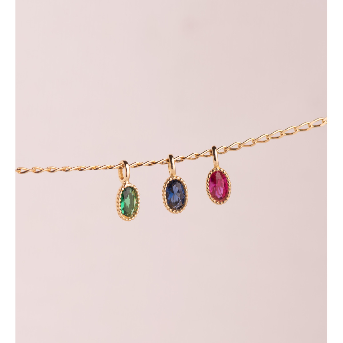 18K COLGANTE ORO AMARILLO OVAL PIEDRA VERDE BORDES BOLITAS. MEDIDA: 9 X 4MM