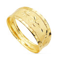 18K SORTIJA ORO AMARILLO MATIZADA CON FLORES TALLADAS Y BORDES TALLADOS. ANCHO 9 MM 18K SORTIJA ORO AMARILLO MATIZADA CON FLORES TALLADAS Y BORDES TALLADOS. ANCHO 9 MM