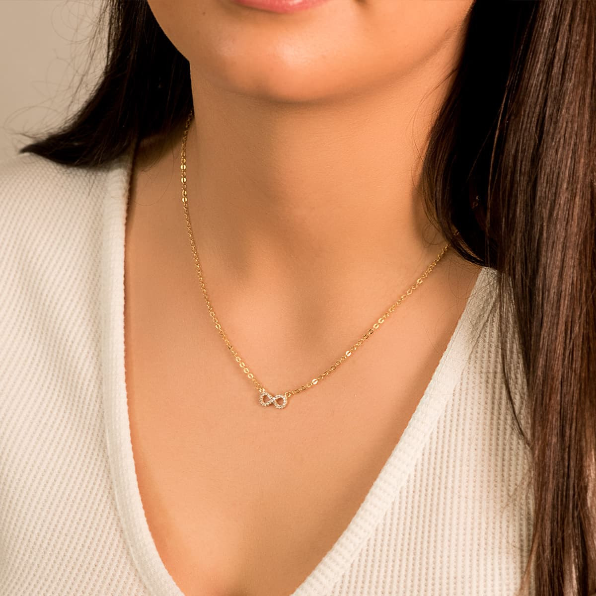 18K COLGANTE ORO BICOLOR INFINITO 12X5 MMCADENA 45CM C. AMOR