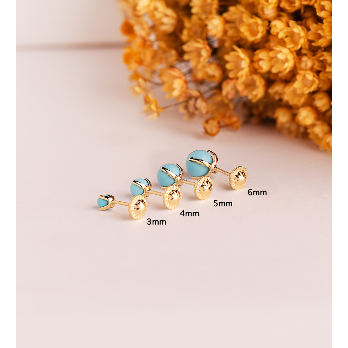 18K PENDIENTES ORO AMARILLO TURQUESA CON 4 GARRAS. MEDIDA: 6 MM. CIERRE TUERCA