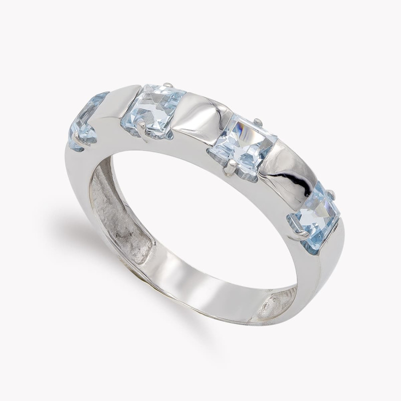 18K SORTIJA ORO BLANCO Y CIRCONITA COLOR AGUAMARINA. ANCHO: 4 MM