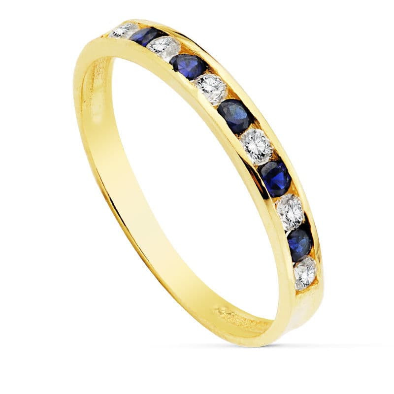 18K SORTIJA ORO AMARILLO CIRCONITA AZULES Y BLANCAS. ANCHO CUERPO 2.5 MM