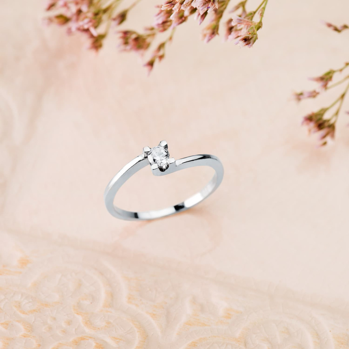 18K SOLITARIO DIAMANTE TALLA BRILLANTE ORO BLANCO 0.150 QTS. SI-H