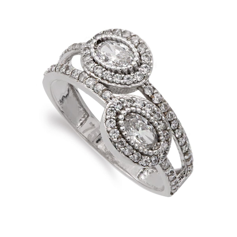 18K SORTIJA ORO BLANCO MOTIVOS OVALES CON CIRCONITAS. ANCHO: 10,5 M