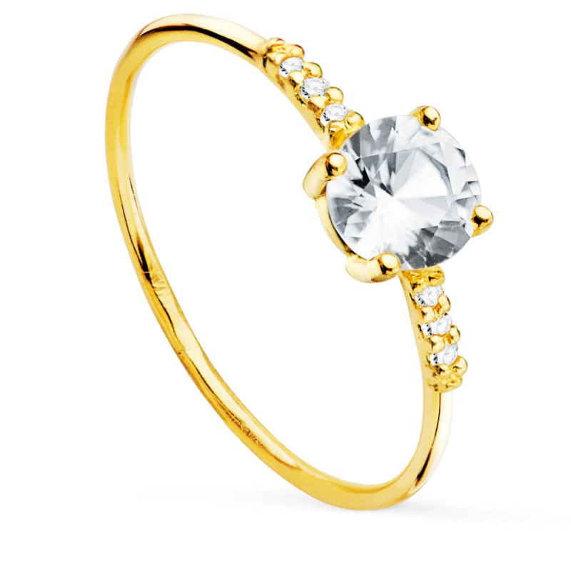 18K SOLITARIO ORO AMARILLO 7 TOPACIOS BLANCOS NATURALES 0.5438 QTS. ANCHO: 5 MM