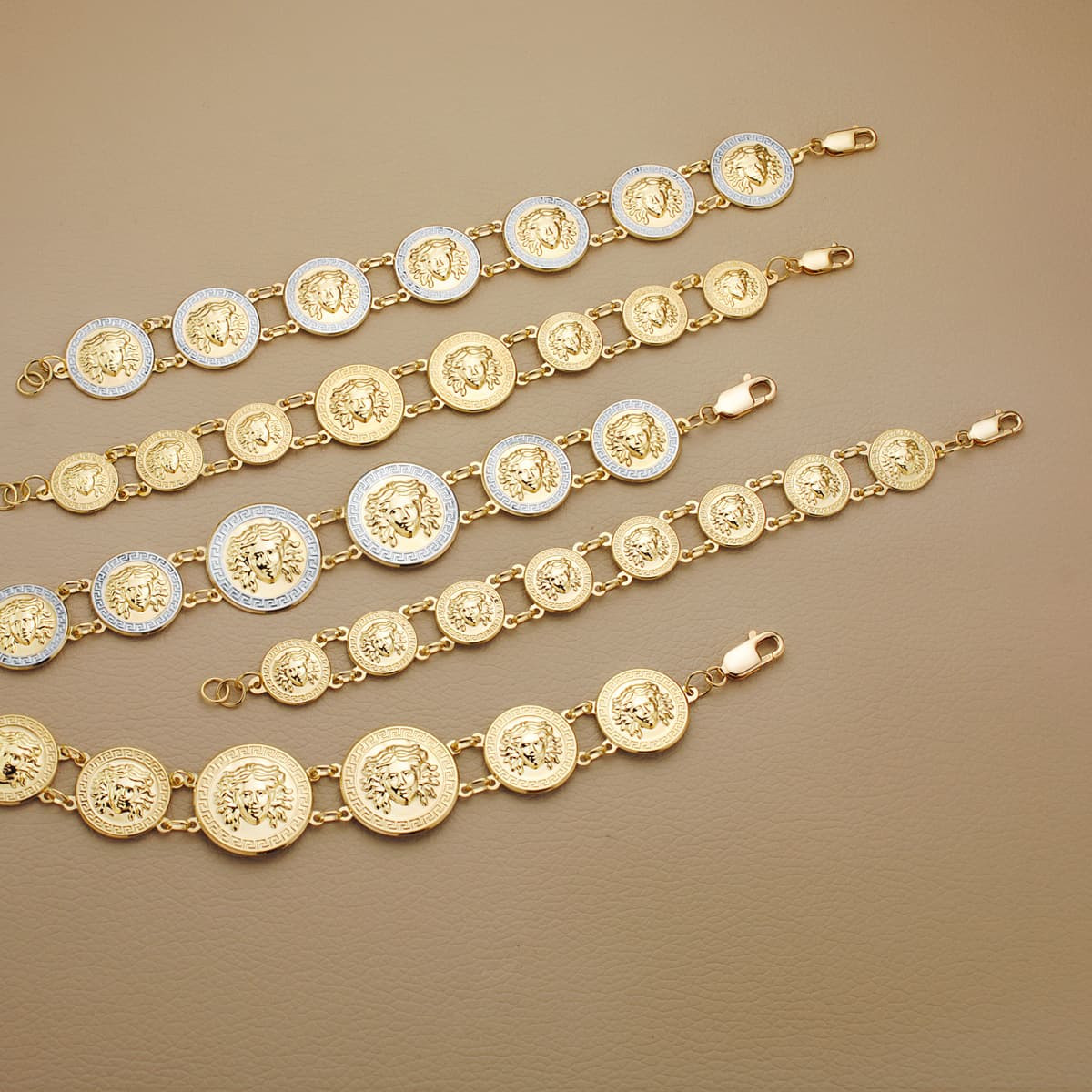 18K PULSERA ORO AMARILLO CON MEDUSAS DE 20 Y 15 MM LARGO 20.5 CM